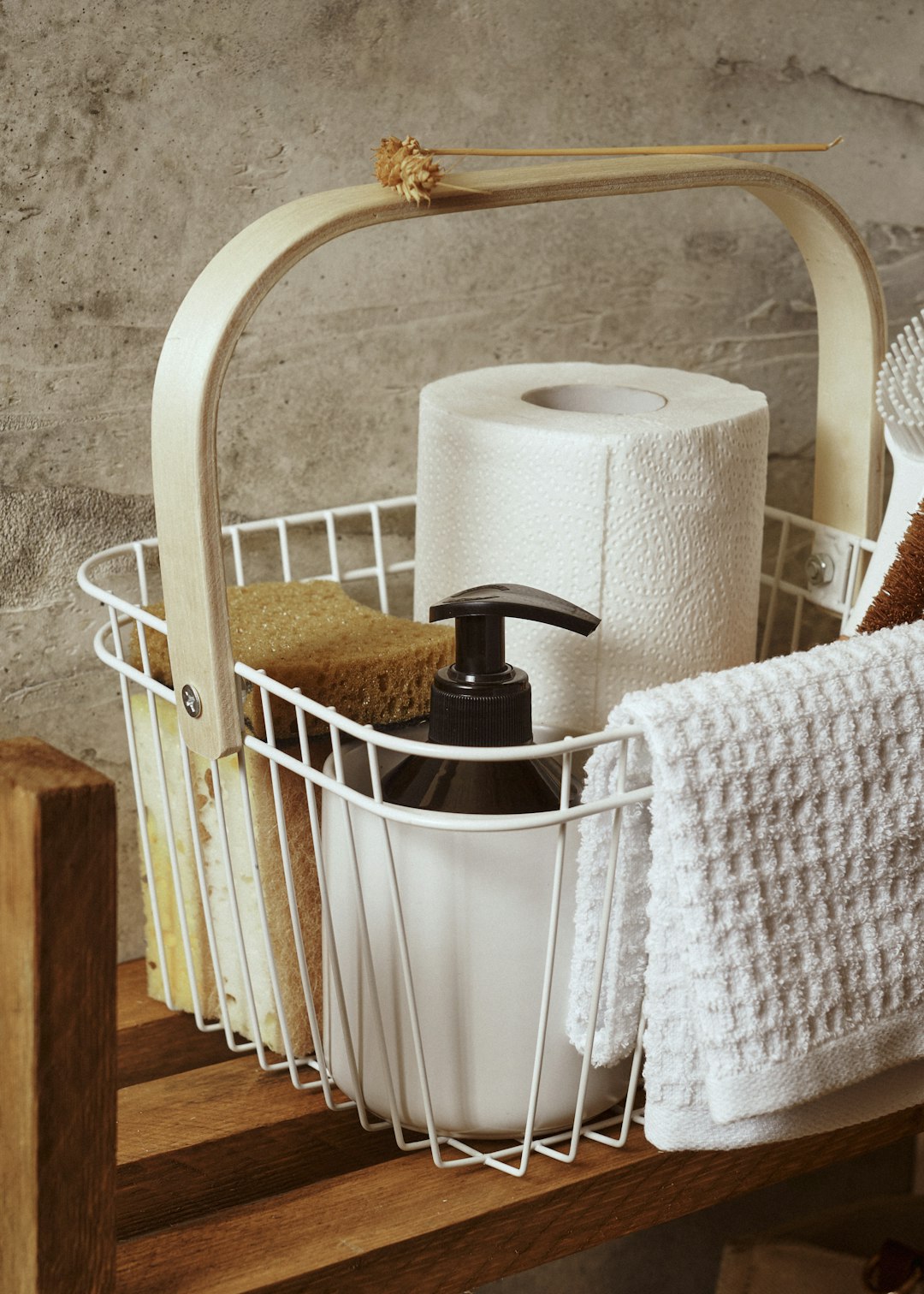 services-04 a-white-basket-filled-with-lots-of-bathroom-items-fji5haulxfq